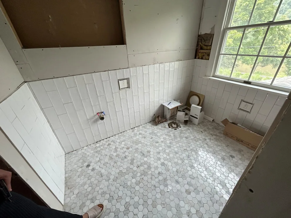 UBE Marble Bathroom Renovation for Guests by Doylestown Builders - Photo 4