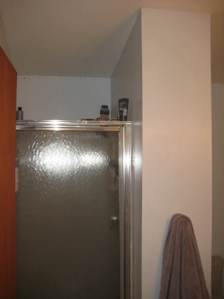 Monochrome Bathroom Expansion Renovation by Sylvestre Remodeling & Design - Photo 7
