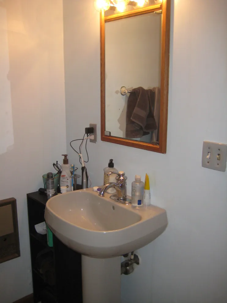 Monochrome Bathroom Expansion Renovation by Sylvestre Remodeling & Design - Photo 5