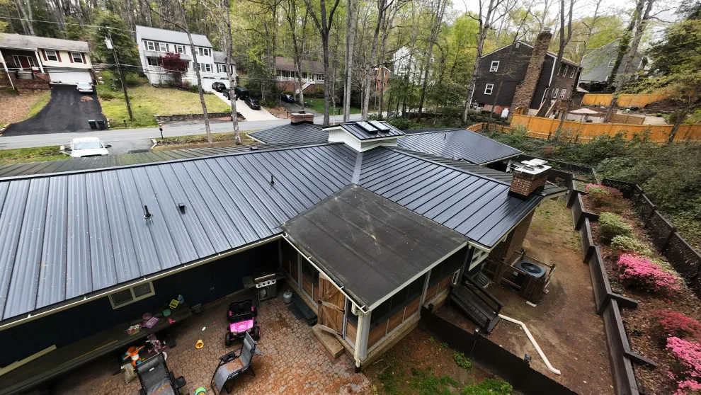 Dark Metal Roofing by Vm Home Improvement LLC - Photo 19