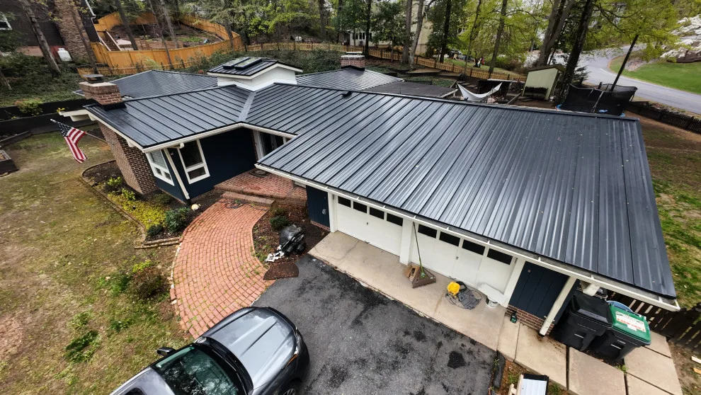 Dark Metal Roofing by Vm Home Improvement LLC - Photo 27