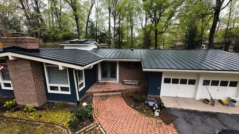Dark Metal Roofing by Vm Home Improvement LLC - Photo 24