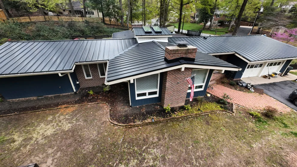Dark Metal Roofing by Vm Home Improvement LLC - Photo 20