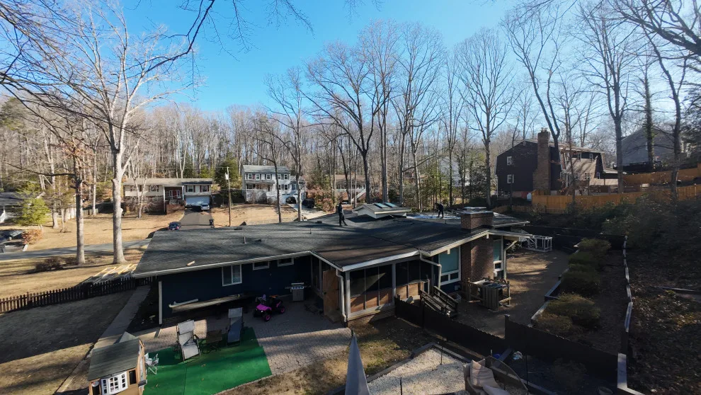 Dark Metal Roofing by Vm Home Improvement LLC - Photo 8
