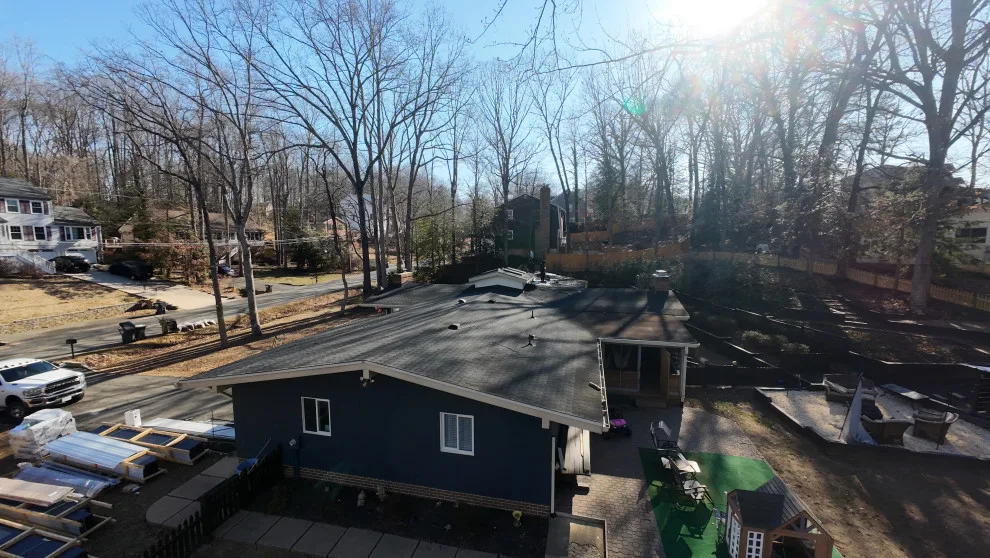 Dark Metal Roofing by Vm Home Improvement LLC - Photo 17