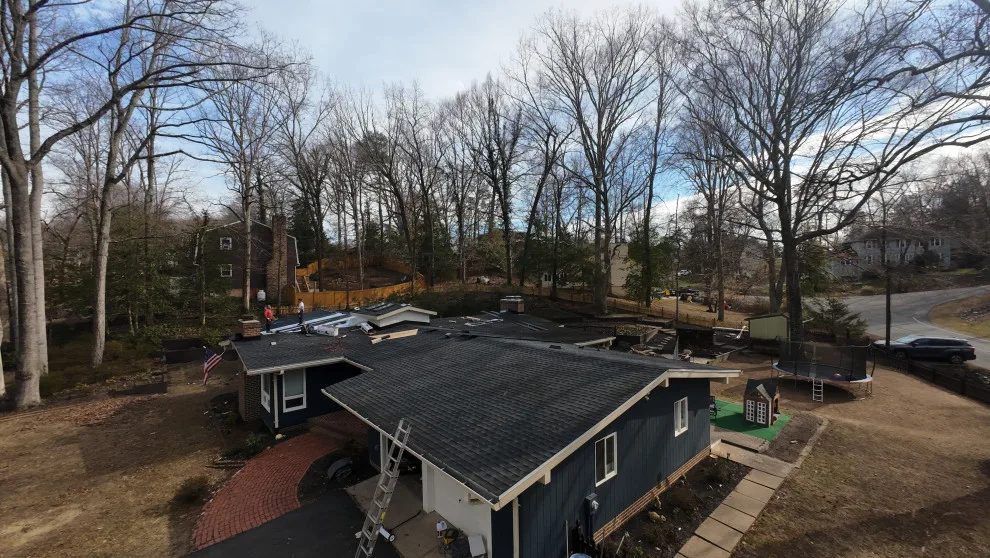 Dark Metal Roofing by Vm Home Improvement LLC - Photo 9