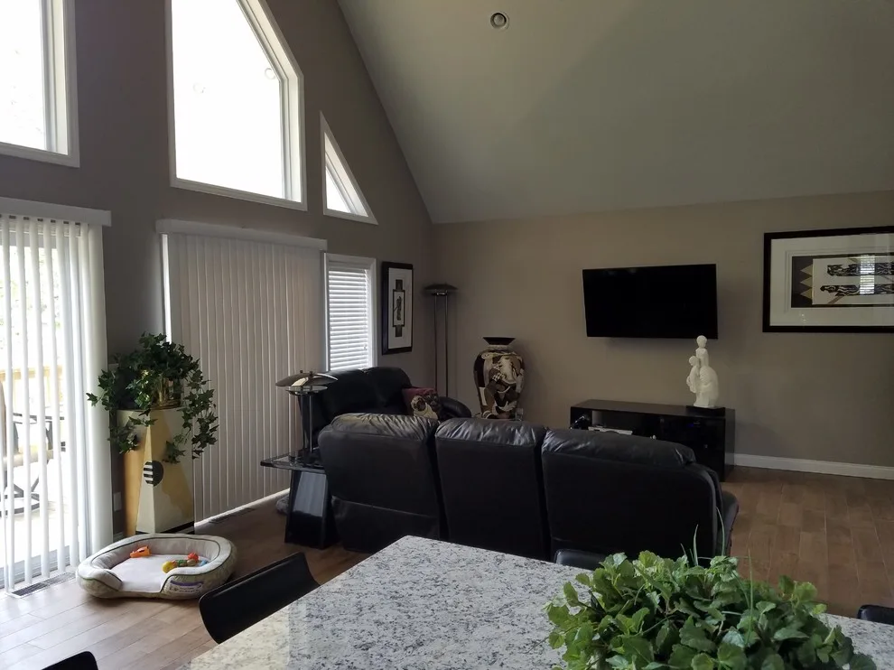 Custom Home with Blue Gable Roof by SDC Custom Homes & Remodeling - Photo 10