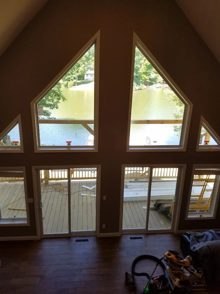 Custom Home with Blue Gable Roof by SDC Custom Homes & Remodeling - Photo 3
