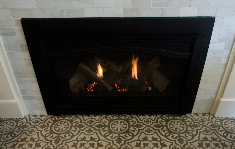 Carrera Marble Revitalizes Living Room Fireplace by Jacobson Construction - Photo 4