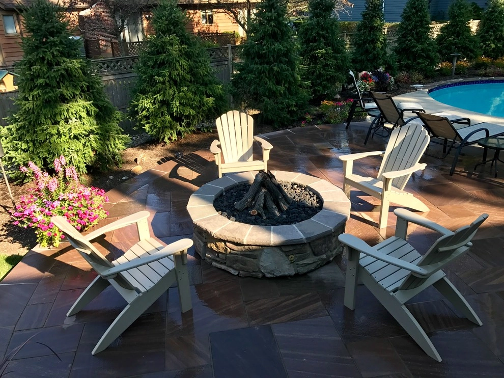 Backyard Retreat - Fire pit and grill station by J. Barker Landscaping Company - Photo 6
