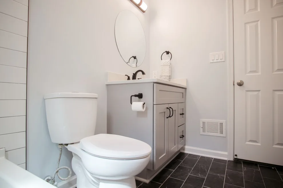 Barcan Court Hall Restroom by DGK Design + Build - Photo 14