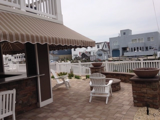 Outdoor Brick Fire Pit & Barbecue by J. Bucci Landscape Design - Photo 3