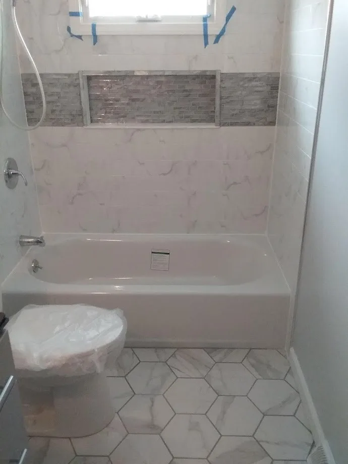 Cheektowaga Veined Bathroom Renovation by New York Kitchen & Bath - Photo 5