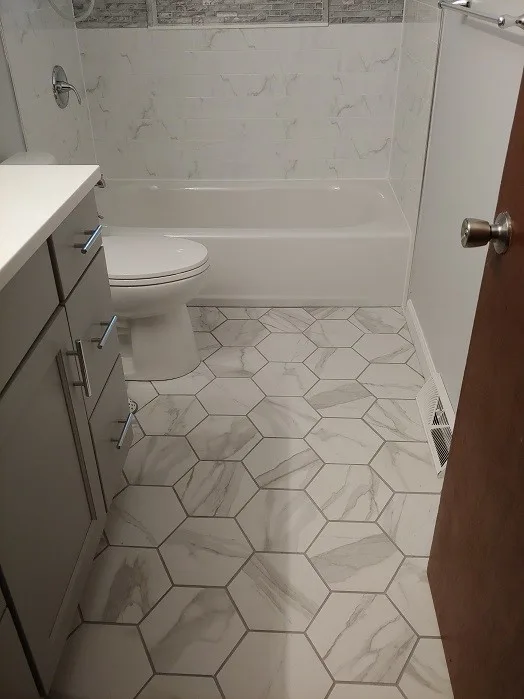 Cheektowaga Veined Bathroom Renovation by New York Kitchen & Bath - Photo 3