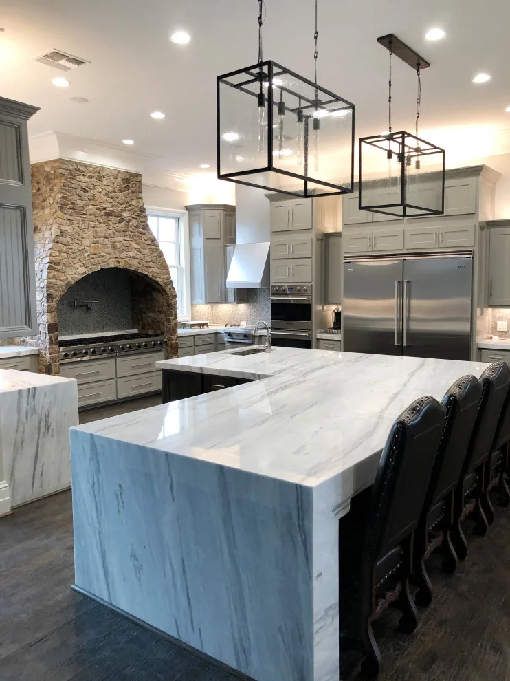 Culinary Paradise with Waterfall Island by Stone Studio A Division Of Contemporary Concepts I - Photo 2