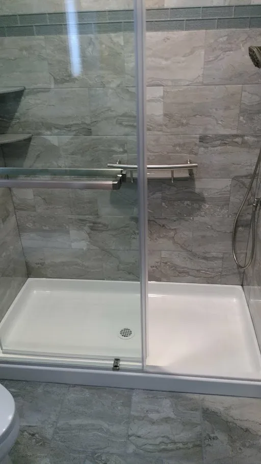 Gray Bathroom Renovation by Clarence by New York Kitchen & Bath - Photo 2