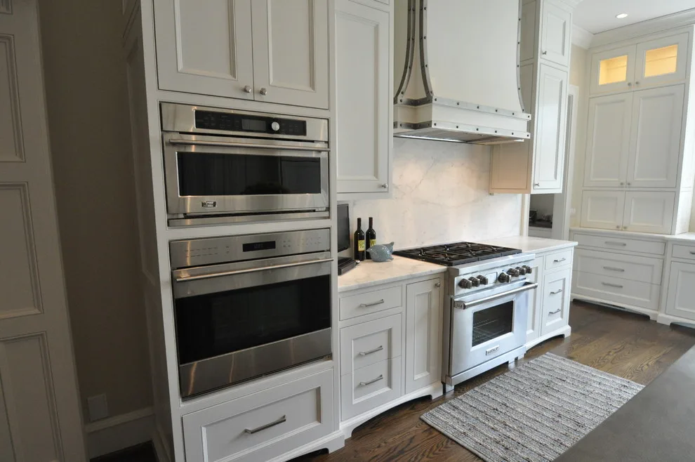 Timeless Kitchen Featuring Pewter Island Countertop by Hartert-Russell - Photo 6