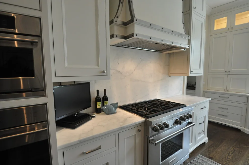 Timeless Kitchen Featuring Pewter Island Countertop by Hartert-Russell - Photo 15