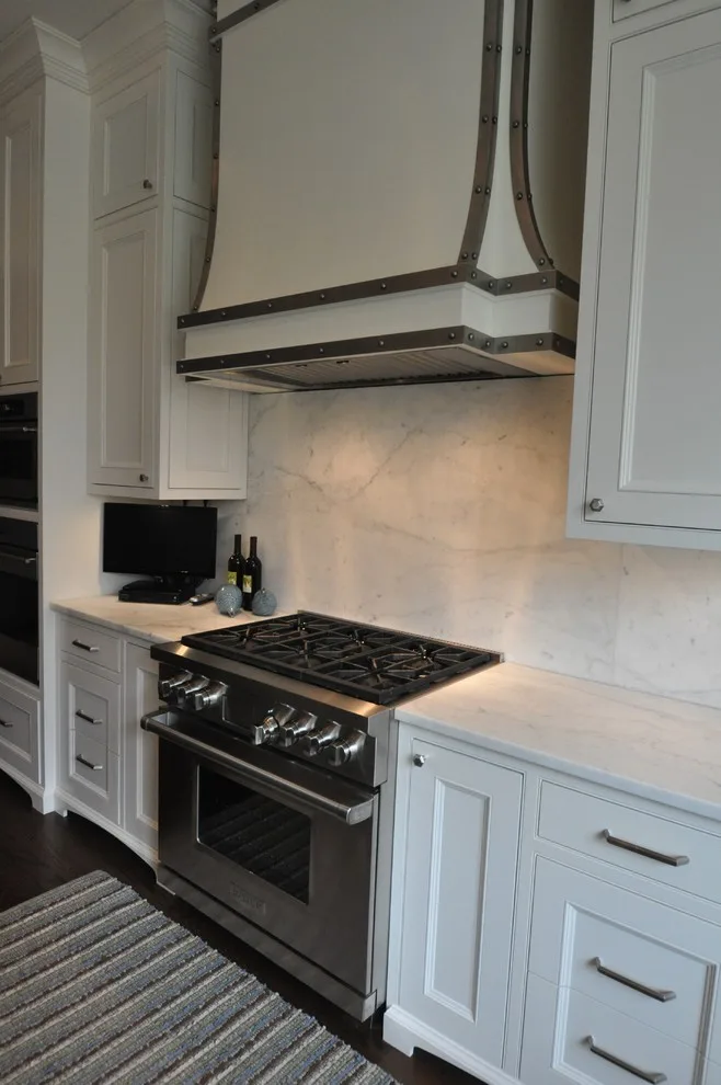 Timeless Kitchen Featuring Pewter Island Countertop by Hartert-Russell - Photo 13