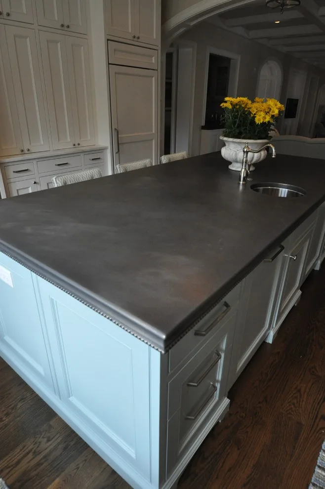 Timeless Kitchen Featuring Pewter Island Countertop by Hartert-Russell - Photo 17