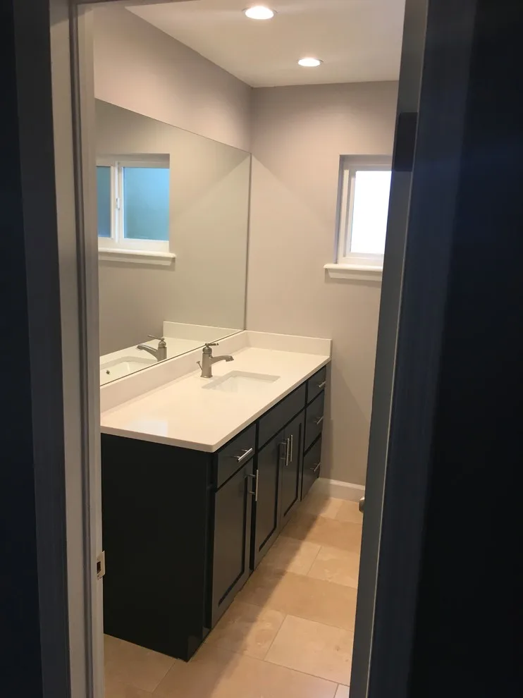 Bathroom Renovation / New Flooring Installation by D.R. Construction - Photo 15