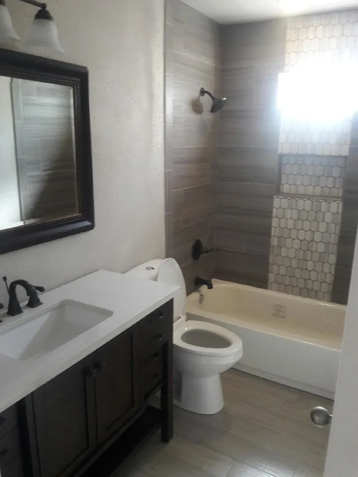 Bathroom Renovation / New Flooring Installation by D.R. Construction - Photo 10