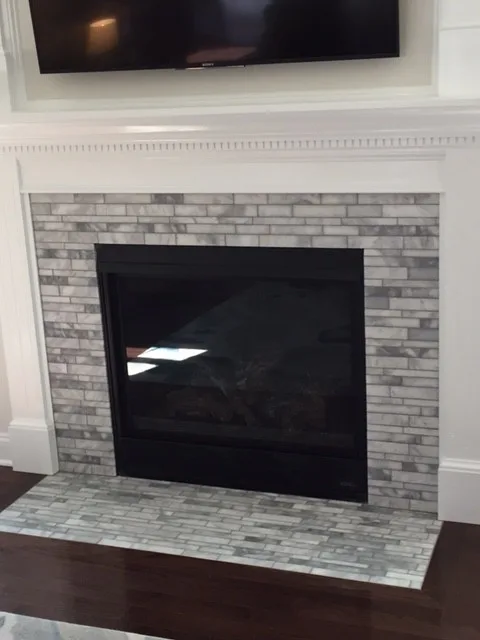 Elegant Linear Carrara Marble Hearth by Ray Tile & Bath - Photo 2