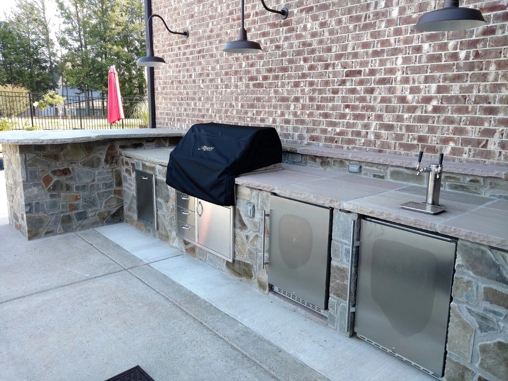 Dual Level Outdoor Kitchen & Bar by Allin Landscaping - Photo 2