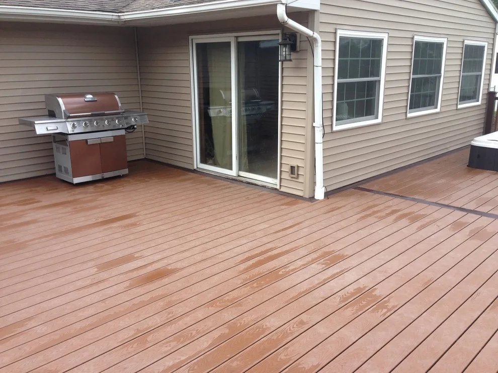 Deck with hot tub and swimming pool by JSR Construction Inc - Photo 2