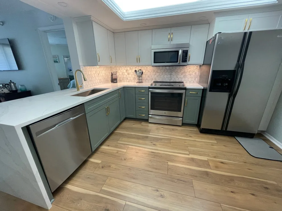 Two-Tone Cabinet Kitchen Remodel in a Condo by Kitchen Solvers Of The Gulf Coast - Photo 5