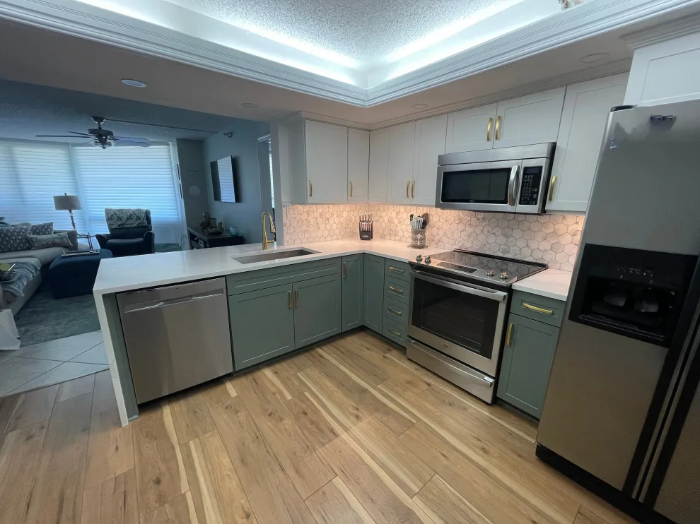 Two-Tone Cabinet Kitchen Remodel in a Condo by Kitchen Solvers Of The Gulf Coast - Photo 3