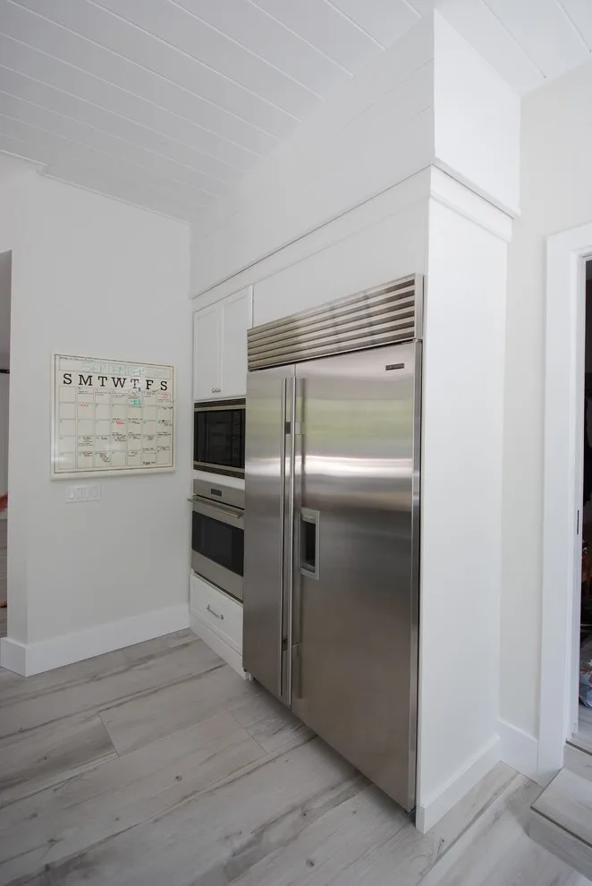 Modern Kitchen on Granada Blvd with Scandinavian Influence by Eleet Fine American Cabinetry - Photo 13
