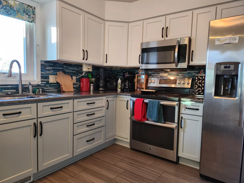 Modern Kitchen Revamp in Dove White and Agave by Kitchen Solvers Of Madison - Photo 13