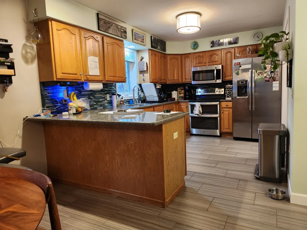 Modern Kitchen Revamp in Dove White and Agave by Kitchen Solvers Of Madison - Photo 8