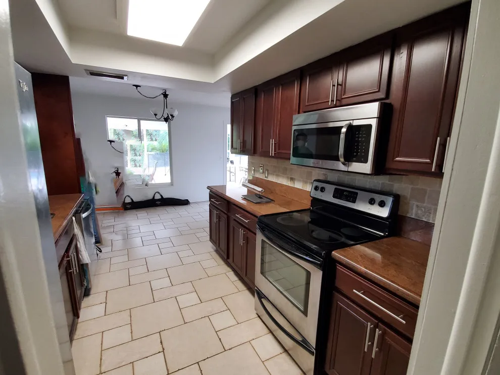 Modern Kitchen Renovation in Matte White Finish by Kitchen Solvers Of Fort Lauderdale - Photo 7