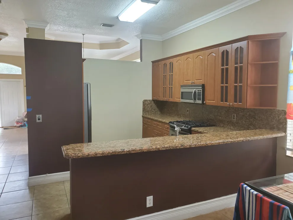 Modern Kitchen Renovation Featuring a Dual Color Scheme by Kitchen Solvers Of Fort Lauderdale - Photo 6