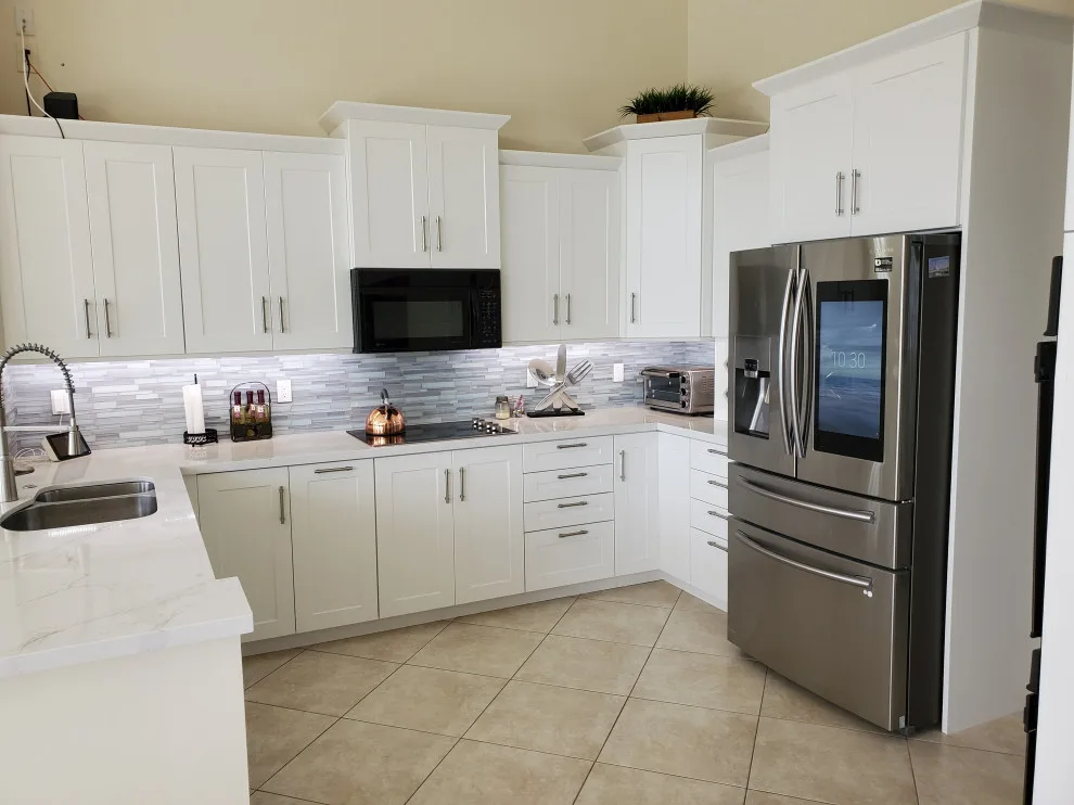 Modern Kitchen Renovation Featuring a Satin White Finish by Kitchen Solvers Of Fort Lauderdale - Photo 9