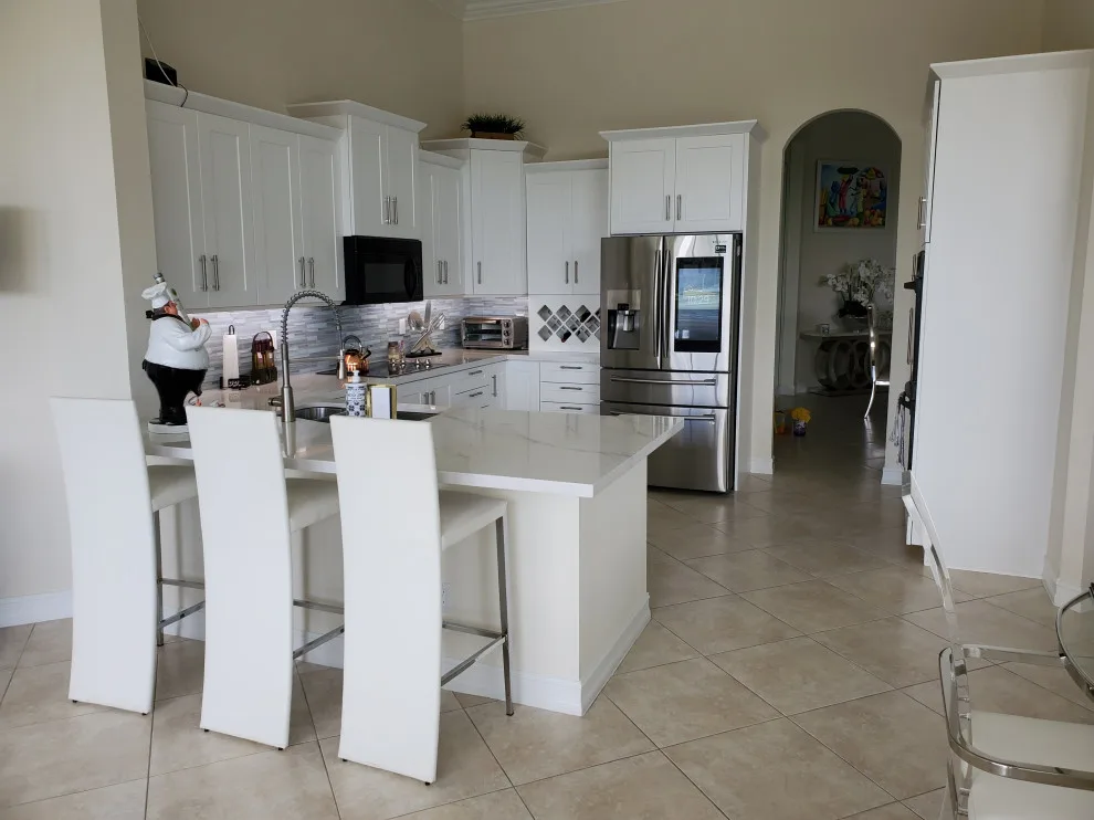 Modern Kitchen Renovation Featuring a Satin White Finish by Kitchen Solvers Of Fort Lauderdale - Photo 3