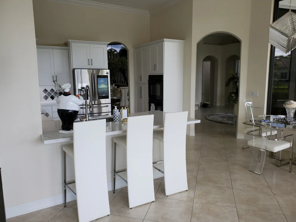 Modern Kitchen Renovation Featuring a Satin White Finish by Kitchen Solvers Of Fort Lauderdale - Photo 7