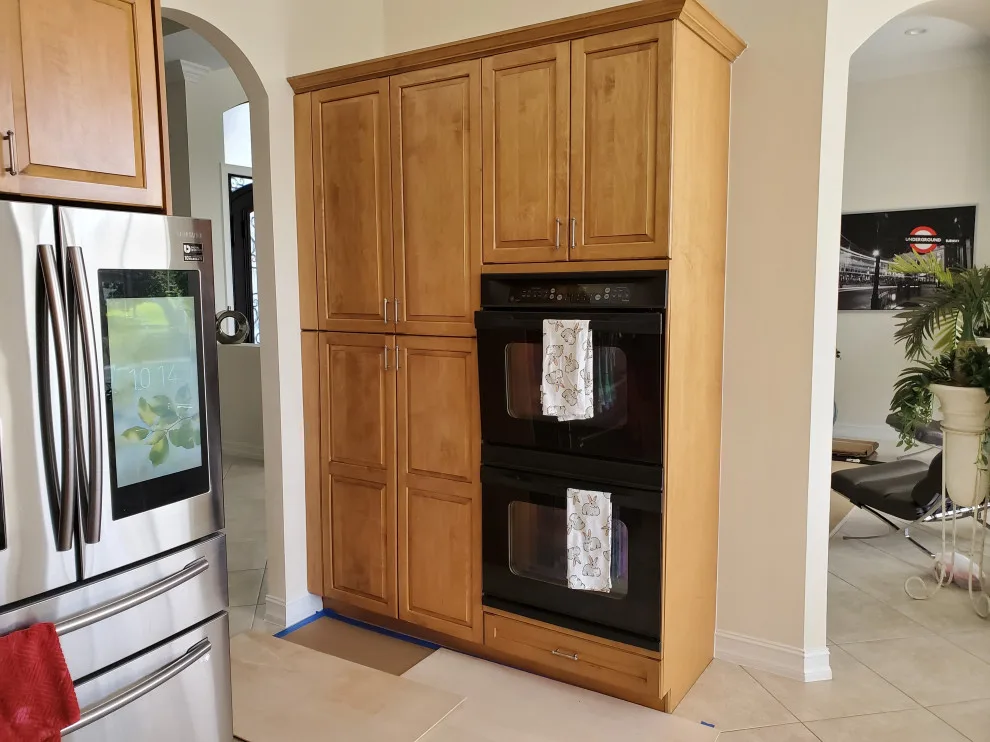 Modern Kitchen Renovation Featuring a Satin White Finish by Kitchen Solvers Of Fort Lauderdale - Photo 11