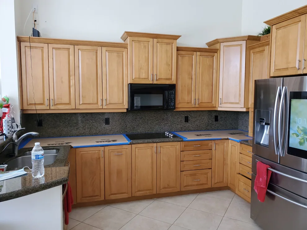 Modern Kitchen Renovation Featuring a Satin White Finish by Kitchen Solvers Of Fort Lauderdale - Photo 6
