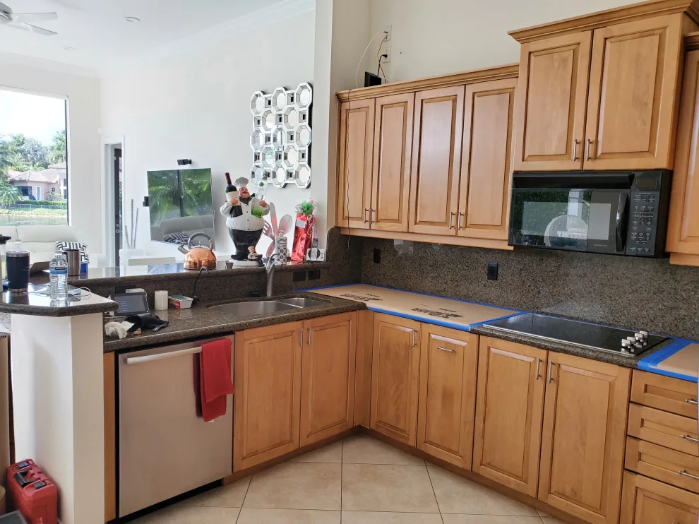 Modern Kitchen Renovation Featuring a Satin White Finish by Kitchen Solvers Of Fort Lauderdale - Photo 8