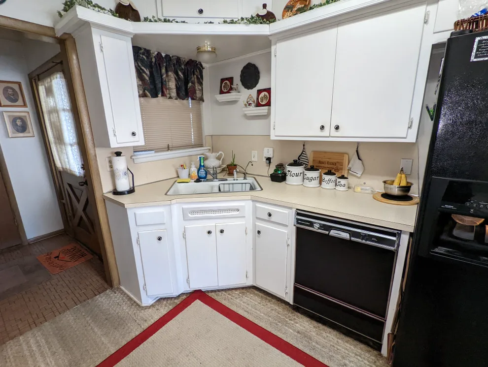 Modern Kitchen Renovation Featuring New White Cabinets by Kitchen Solvers Of Oklahoma City - Photo 4