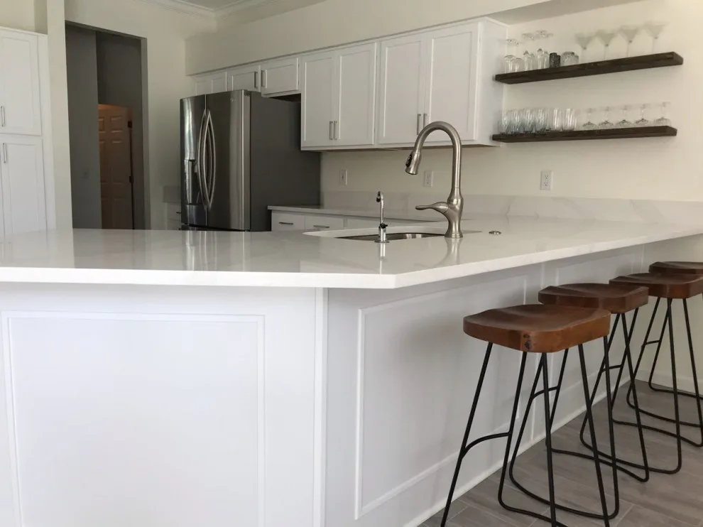 Modern Kitchen Renovation Featuring White Paint by Kitchen Solvers Of The Gulf Coast - Photo 2