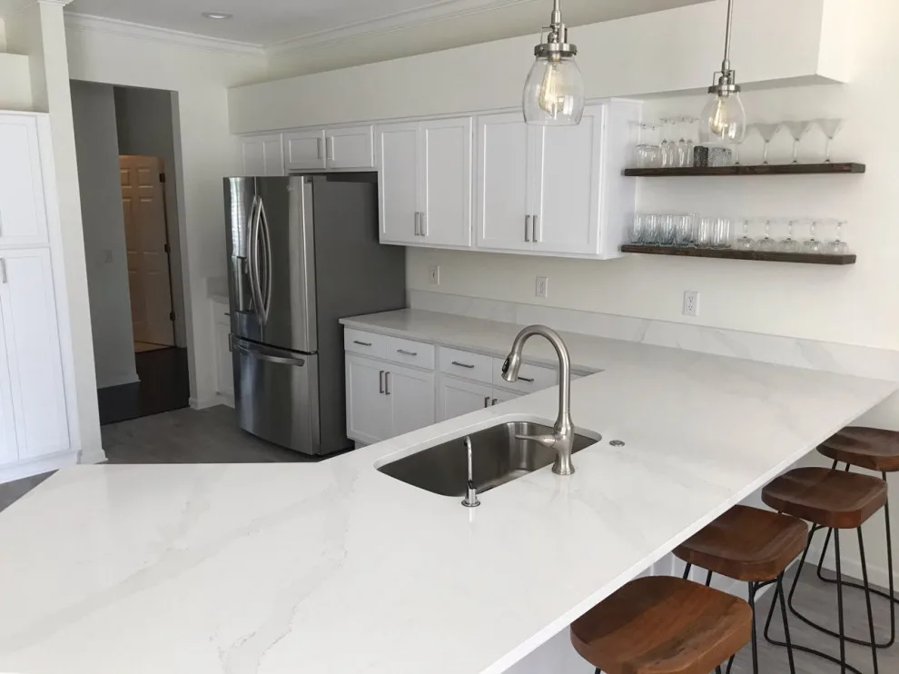 Modern Kitchen Renovation Featuring White Paint by Kitchen Solvers Of The Gulf Coast - Photo 3