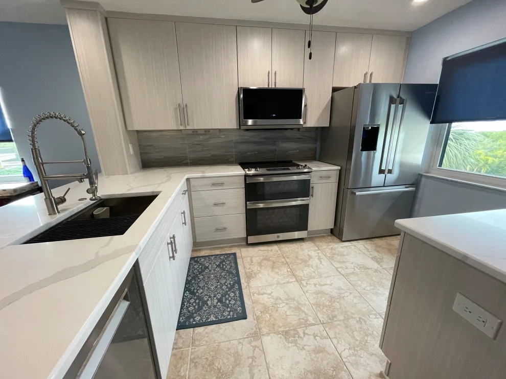 Modern Kitchen Renovation Featuring New Cabinets by Kitchen Solvers Of Orlando - Photo 2