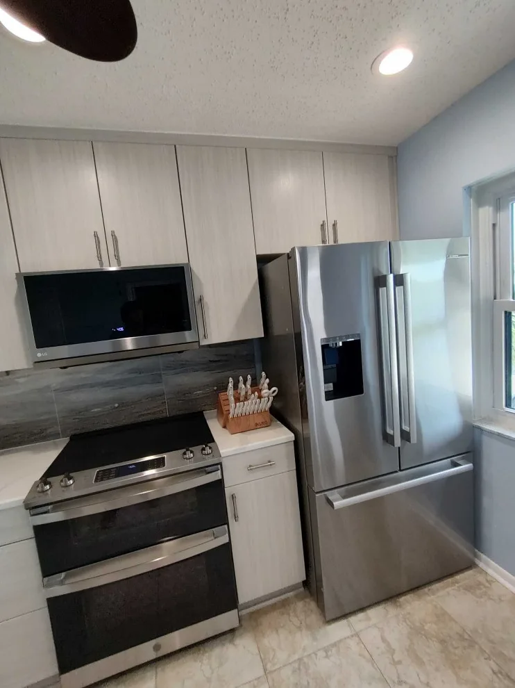 Modern Kitchen Renovation Featuring New Cabinets by Kitchen Solvers Of Orlando - Photo 6