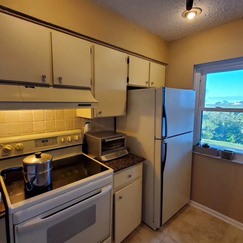 Modern Kitchen Renovation Featuring New Cabinets by Kitchen Solvers Of Orlando - Photo 8