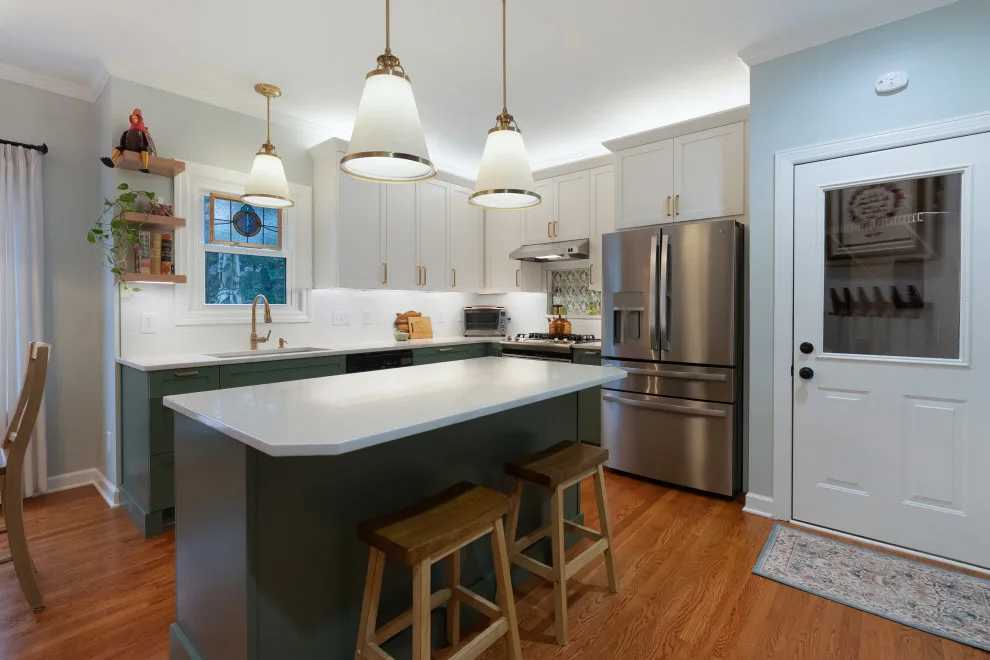 Modern Kitchen Renovation Featuring New Two-Tone Cabinets by Kitchen Solvers Of Spring Hill - Photo 19