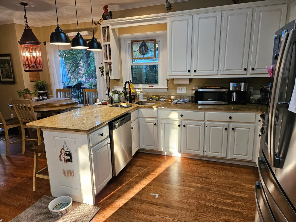 Modern Kitchen Renovation Featuring New Two-Tone Cabinets by Kitchen Solvers Of Spring Hill - Photo 35